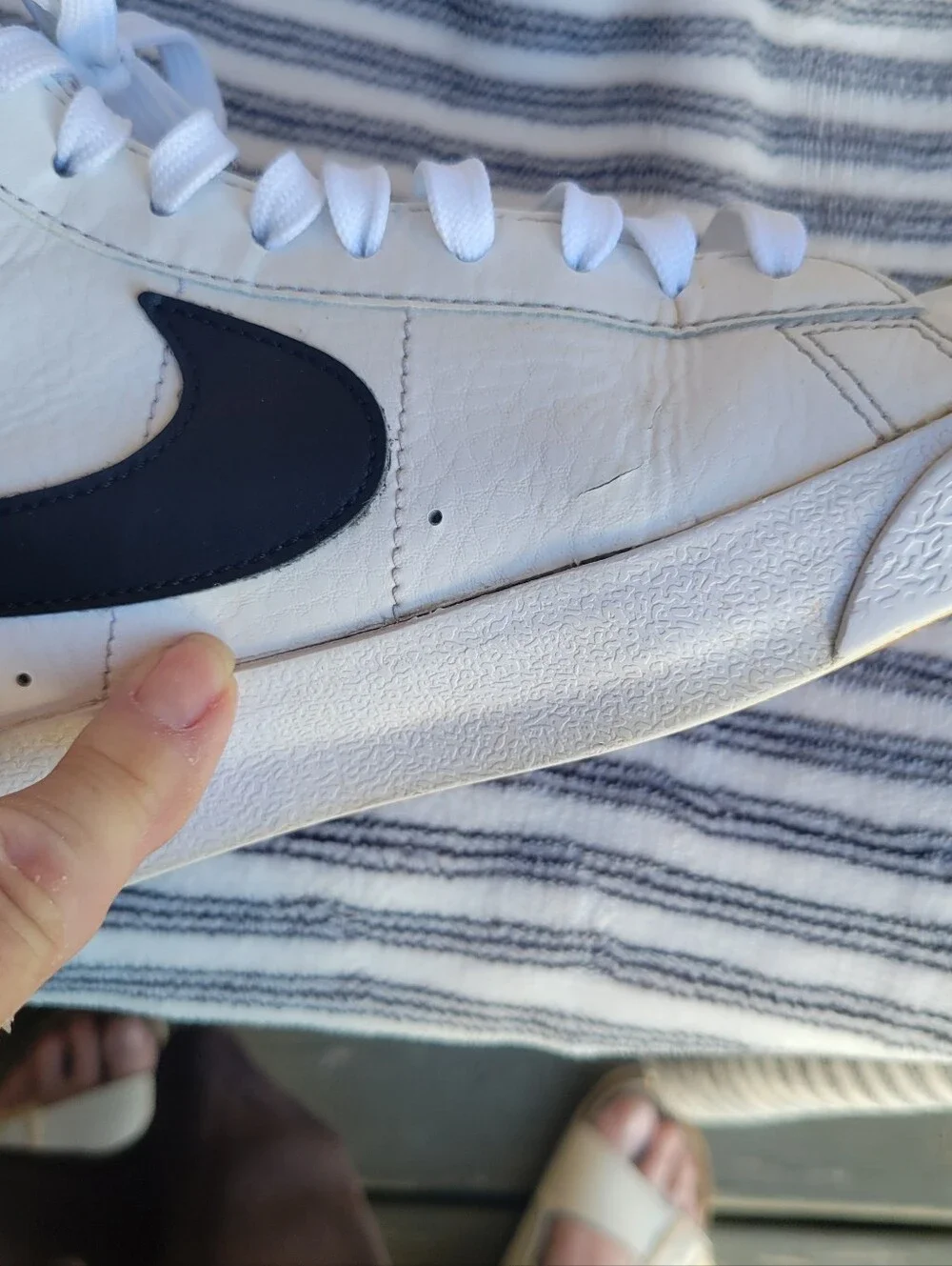 Nike White High-Top Blazers Sneakers with Black Swoosh and Red Tongue Tag